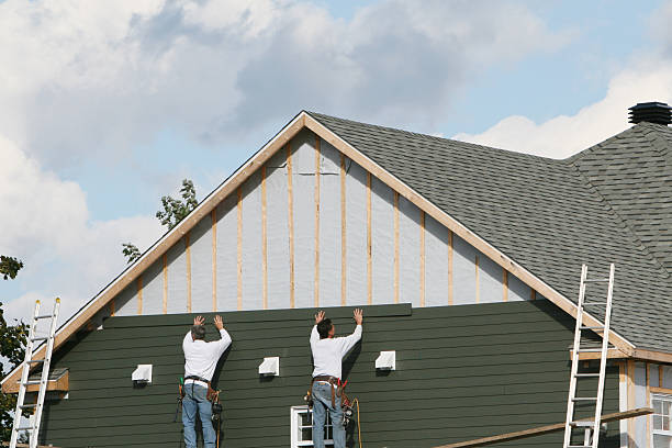 Professional Siding Contractor technician working in Kingsville, MD